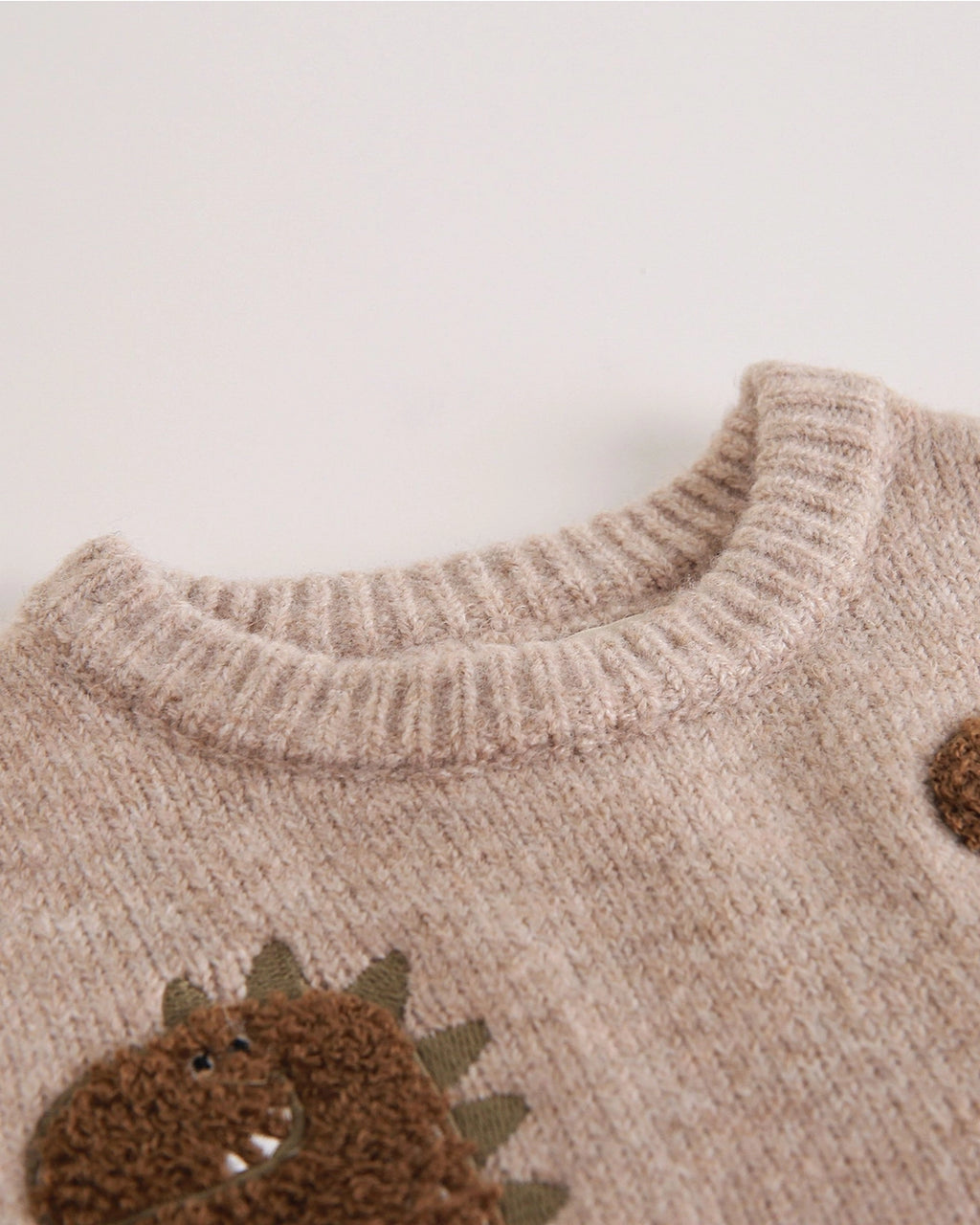 Newness Kids megztinis su dinozaurais